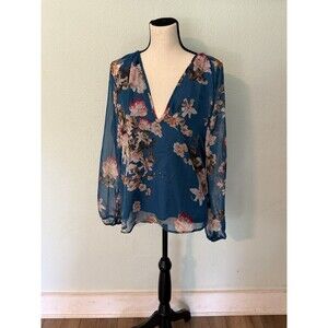 Women’s Small teal-colored, long-sleeved floral blouse with a deep V-neckline
